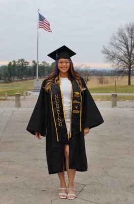 Rashell in graduation robes